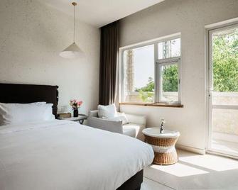 Manju Hotel - Baoshan - Bedroom