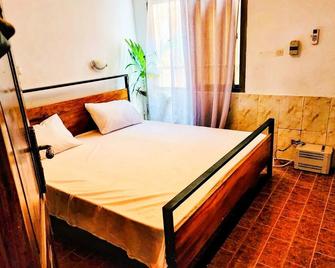 Beautiful and charming small appartment in a quiet place - Kinshasa - Bedroom