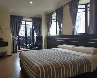 Hong Kong Hotel - Brinchang - Schlafzimmer