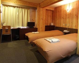 Benefit Hotel Okayama - Okayama - Schlafzimmer