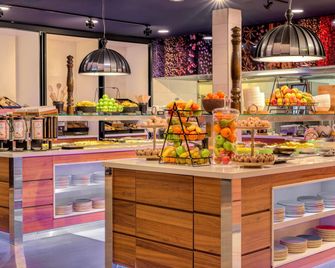 Mövenpick Hotel Amsterdam City Centre - Ámsterdam - Comedor