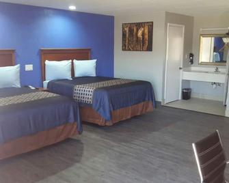 Paris Inn and Suites - Paris - Habitación