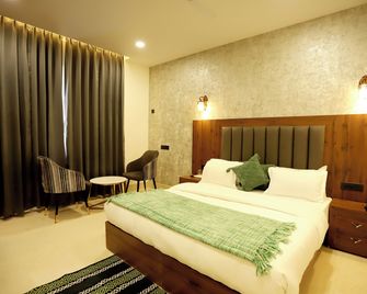 Hotel Dhingra Inn - Rewāri - Bedroom