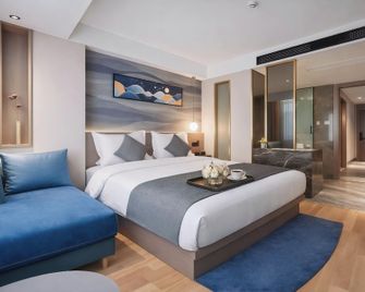 Wenshan Fengbang Hotel (Qihua Plaza Branch) - Wenshan - Bedroom