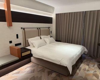 Yahaige Hotel - Qingdao - Habitación