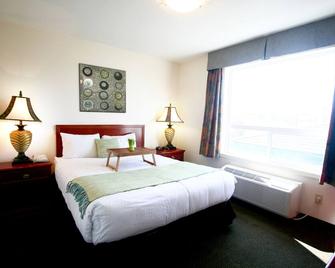 Foxwood Inn & Suites - Drayton Valley - Schlafzimmer