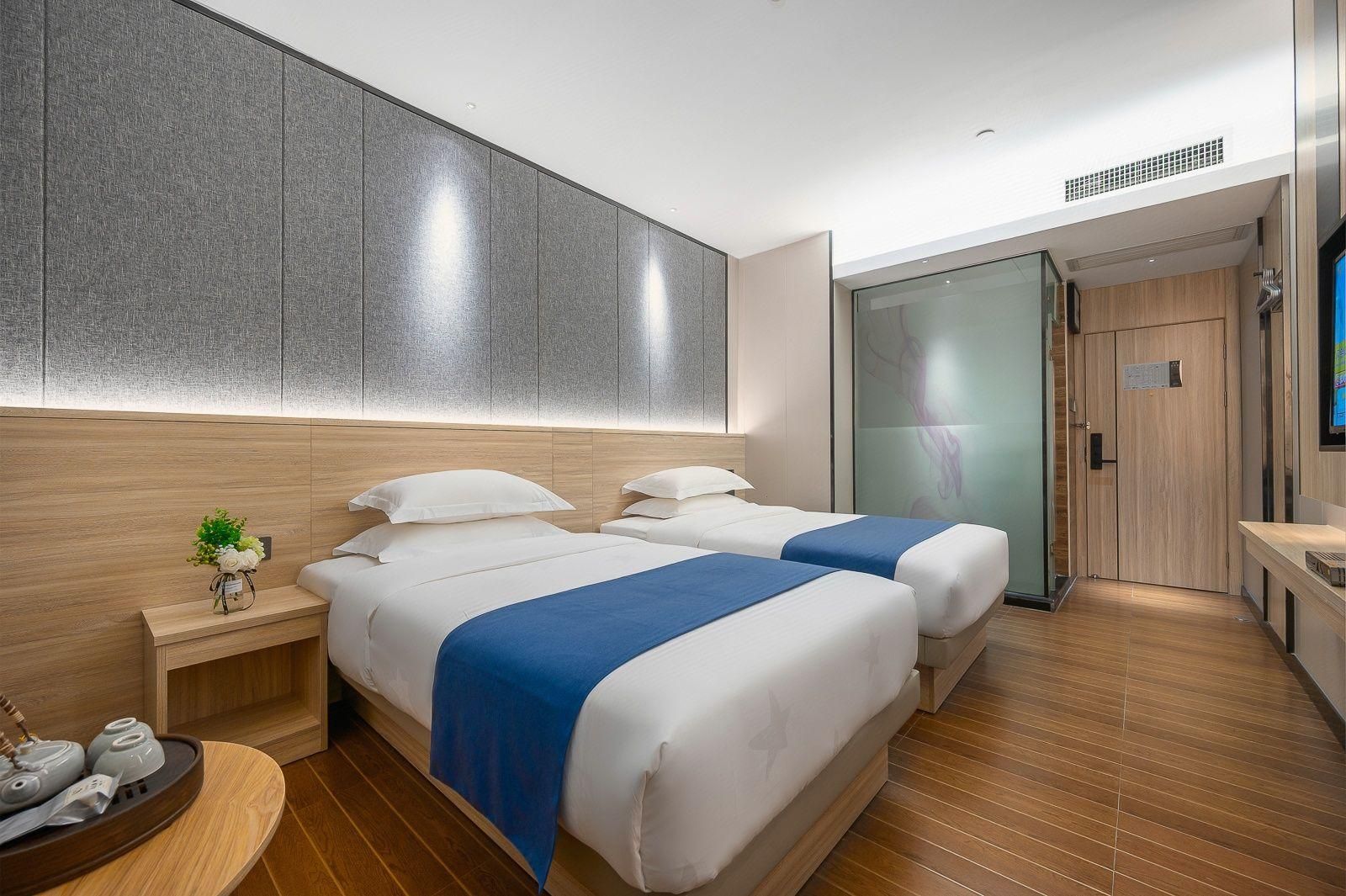 Wenxing Hotel Guangzhou Huashi Branch - גואנגג'ואו - חדר שינה