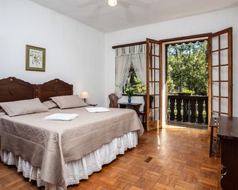 Hotel Fazenda São Moritz - טרסופוליס - חדר שינה