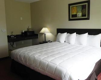 Yorktown Inn And Suites - Yorktown - Bedroom