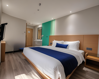 Celebrity Hotel (Jincheng Central Pedestrian Street People's Hospital Store) - Yulin - Bedroom