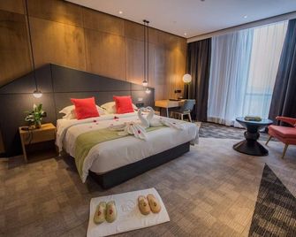 Yahe Hotel Liuzhou - Liuzhou - Ložnice