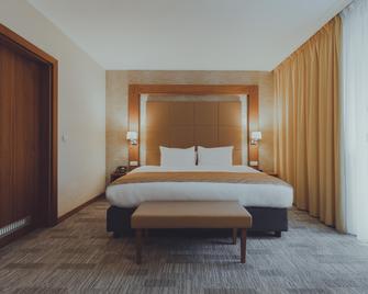 هوليداي إن سوكبي، آن آي آيتش جي هوتل - سكوبي - غرفة نوم