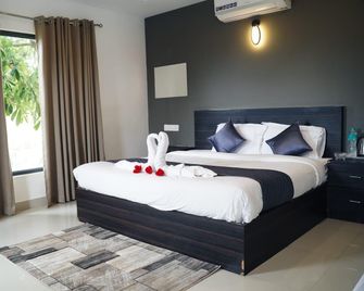 Konfudha Resort - Kalpetta - Slaapkamer