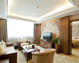 Taoranju Hotel - Linyi - Living room