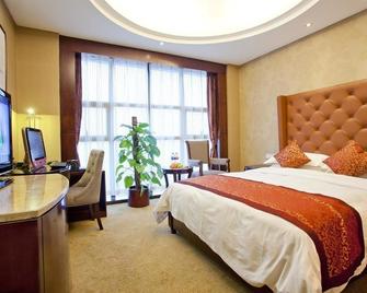 Changsha Xingwei Huatian Hotel - Changsha - Bedroom