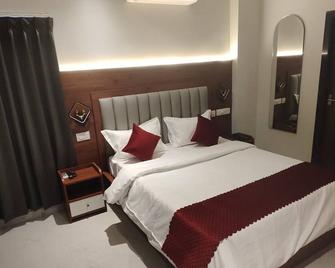 Vaishnavi Inn - Rājahmundry - Bedroom