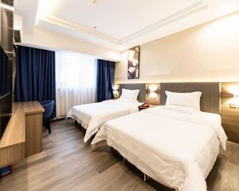 Guangzhou Xiguan Yuehua Hotel - Guangzhou - Bedroom