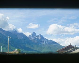 Dengba Snow Mountain International Youth Inn - Lệ Giang - Phòng ngủ