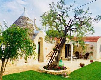 Trullo Rinaldi - Private Pool and Sauna - Castellana Grotte - Vista del exterior