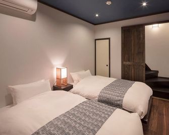 Hanakagari Machiya House - Kyōto - Schlafzimmer