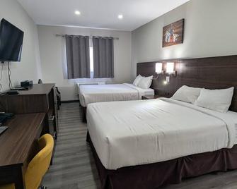 Econo Lodge - Cochrane - Slaapkamer