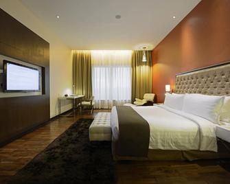 The Deltin Hotel - Daman - Slaapkamer
