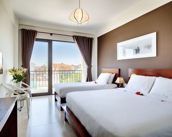 Hoi An Green Apple Hotel - הוי אן - חדר שינה