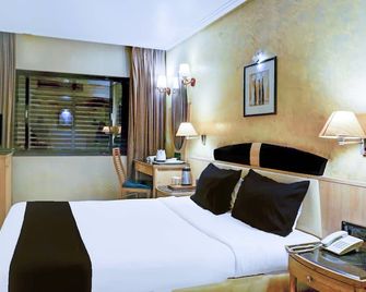 Premium Room Near Pataleshwar Temple, Pune - Pune - Bedroom
