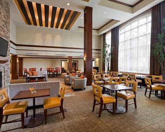 Air-Conditioned Suite | Gym, Indoor Pool - North Wales - Restaurant