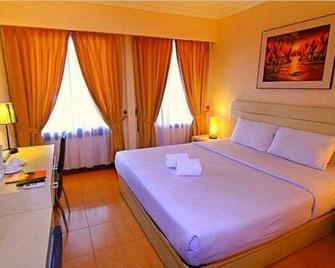 The Aliga Hotel - Padang - Bedroom