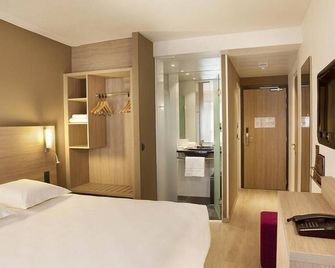 إيسكالي أوشينيا أورليانز - أورليون - غرفة نوم