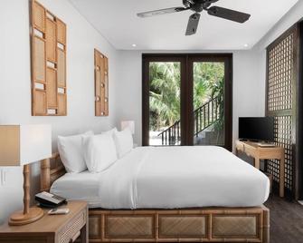 مينيلوك أيلاند ريزورت - إلنيدو - غرفة نوم