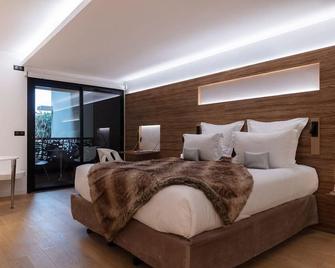 Hôtel & Restaurant Origines par Adrien Descouls - Teritoria - Le Broc - Slaapkamer