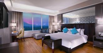 The Alana Hotel & Convention Center Solo By Aston - Surakarta City - Phòng ngủ