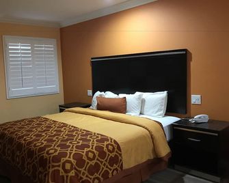 Executive Suites Inn - Westminster - Camera da letto