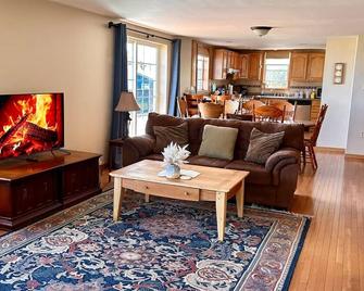 Lake Michigan views! Complimentary housekeeping with monthly stays Mar-Apr. - Two Rivers - Living room