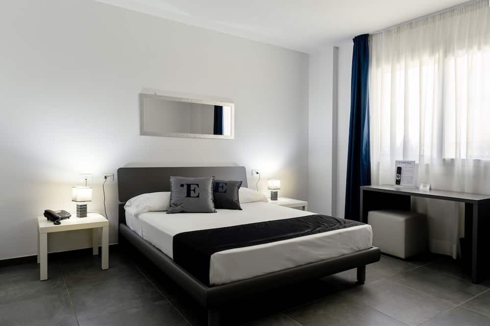 L'Essenza Hotel - אולביה - חדר שינה