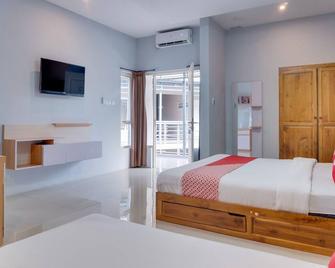 Hotel O Kate'el Inn - Banyuwangi - Schlafzimmer