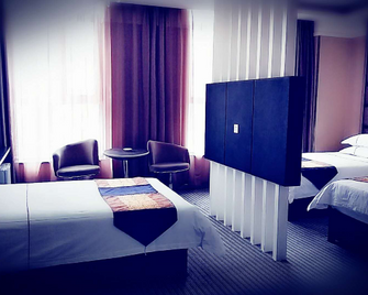 Xiang Zhi Li Hotel - Hami - Habitación
