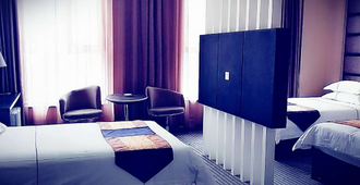 Xiang Zhi Li Hotel - Hami - Bedroom