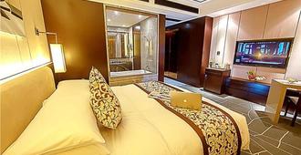Regis Joy International Hotel - Zhengzhou - Habitación