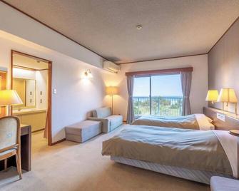 Coral Palms - Amami - Schlafzimmer