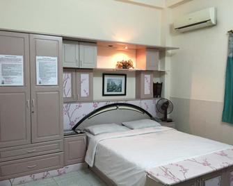 Timi Hotel - Ho Chi Minh Stadt - Schlafzimmer