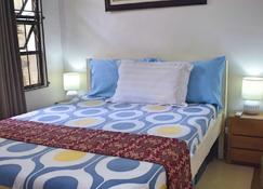 Cozy 1-bedroom house in quiet residential village. - Iloilo City - Κρεβατοκάμαρα