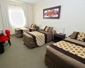 Hotel Amucan - Neuquén - Bedroom
