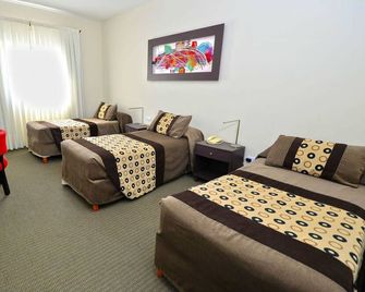 Hotel Amucan - Neuquén - Schlafzimmer