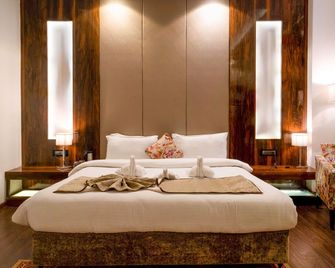 Hotel 5 Flowers Ananta Elite, Kota - Kota - Habitación