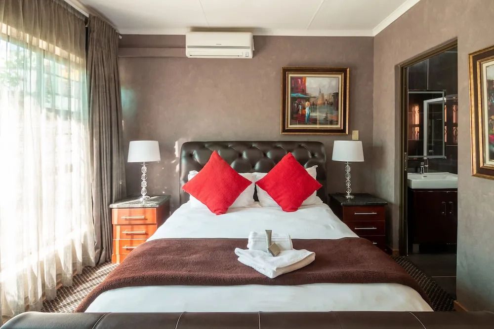 Lala Dene Lodge - בלואמפונטיין - חדר שינה