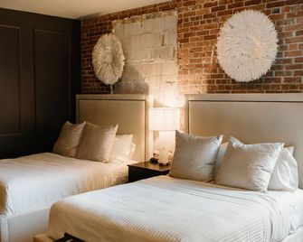 Hatchery Hotel & Event Center - La Crosse - Schlafzimmer