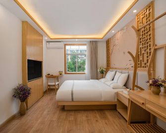 Kunmin Xiangmei Bangpo Hotel - Kunming - Bedroom